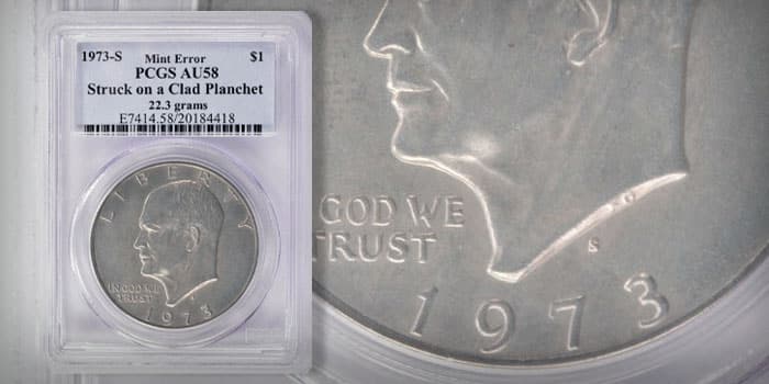 1973-S Eisenhower dollar edge comparison showing copper-nickel clad core versus silver edge for wrong-planchet error identification